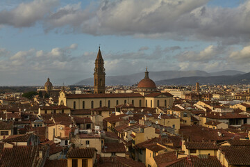 Fototapeta premium Wide Florence Cityscape with Dome and Bell Tower Under Clouds