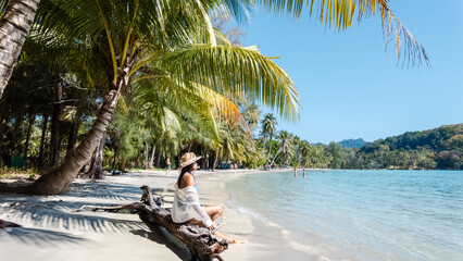 Relaxing day at Khlong Hin Beach on Koh Kood Island, Thailand with sun, sea, and tranquility