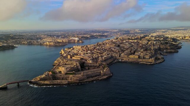 Drone aerial view of Birgu (Vittoriosa) peninsula and the Grand Harbour with historic fortifications