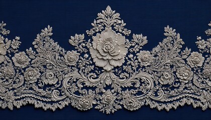 Ornate silver floral baroque border decoration appears against a deep blue background