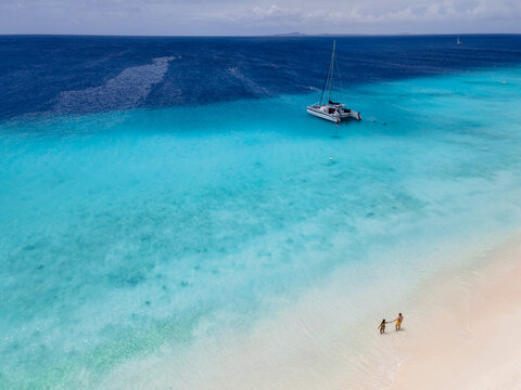 Explore the stunning coastline of Klein Curacao with idyllic turquoise waters and white sands