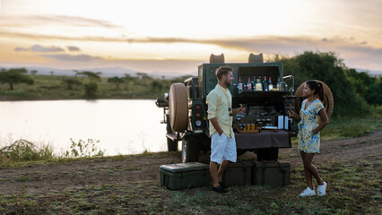 Enjoying sunset drinks in Kruger National Park, South Africa, surrounded by natures beauty