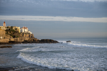 Atlantic waves breaking near rocky coastline in Estoril