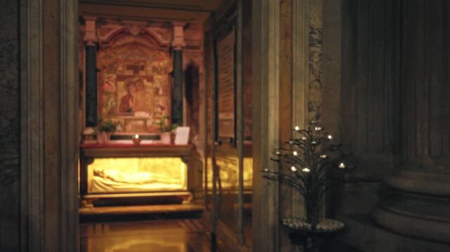 Blurred bokeh church interior showing candlelit altar, columns and reflective marble floor with soft defocused depth; background backplate copyspace.