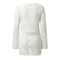 Fototapeta premium White crochet lace floral dress back view