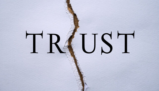 Torn Paper With Word Trust, Broken Trust Concept and Emotional Damage