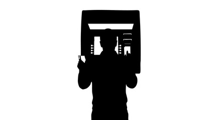 Silhouette of a person holding a large smartphone with a cityscape on the screen in a modern setting