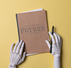 Robotic Hands Holding a Brown Notebook with Future Concept on Yellow Background