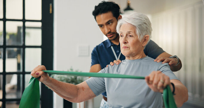 Old woman, physiotherapist and resistance band in clinic with stretching, support or rehabilitation. Senior person, orthopedic worker and physical therapy for mobility exam, fitness or recovery help.