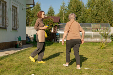 women meet and discuss the apple harvest