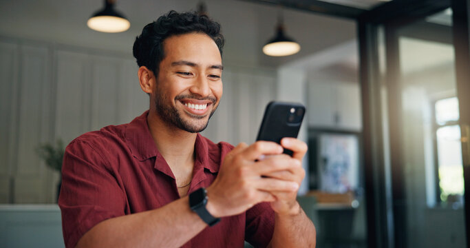 Home, smile and man with smartphone for app, comment or typing on social media forum on weekend. Mobile, platform and happy person in house for communication, online chat or response on message board
