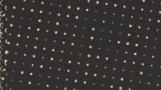 Dark backdrop covered in a repeating dot pattern of varying sizes and a light, peachy color