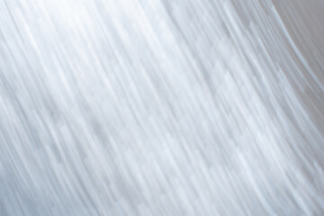 Diagonal metallic foil texture with smooth abstract reflections