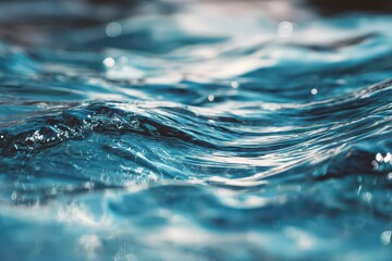 Aqua Blue Water Surface with Reflections and Bokeh Effects Soft Lighting Abstract Ocean Wave Pattern Textured Water Background Liquid Ripple Close Up Full Frame