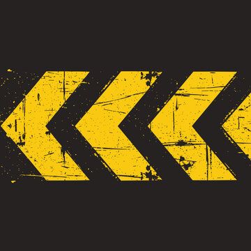 Yellow Chevron Arrow Warning Sign on Black Background &ndash; Road Safety Direction Symbol