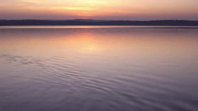 Lake Muted muted lake under dawn glow; clean background; stock-safe, car-free; no faces; no trademarks scene 4 Abstract cinematic angle