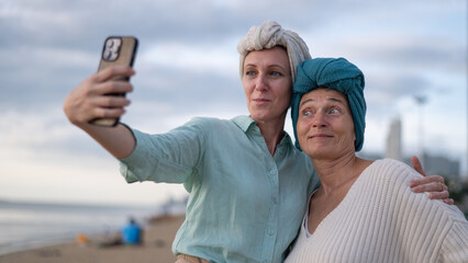 Moment friend support resilience and compassion, often associated with of battling cancer wearing a headscarf a common symbol of strength among cancer patients undergoing treatment.