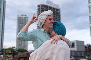 Moment friend support resilience and compassion, often associated with of battling cancer wearing a headscarf a common symbol of strength among cancer patients undergoing treatment.