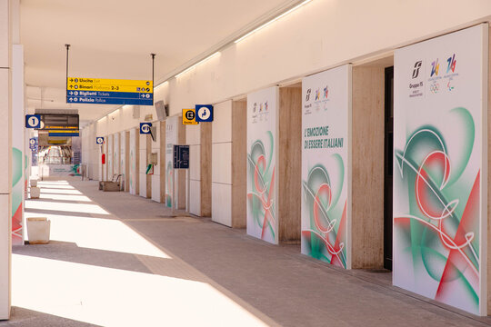 Cortina, Italy - January 27, 2026: Olympic Games signage and information displays at a modern venue in Cortina, featuring colorful graphics and directional signs for visitors