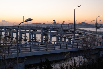 Naklejka premium Xinghai Bay Bridge and Coastal Road in Dalian, China