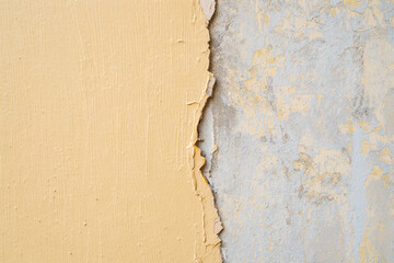 Broken plan fixed plan Peeling yellow paint on textured concrete wall surface image