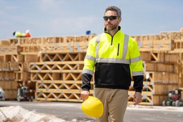 Builder civil engineer at building. Advertisement copy space. Worker at construction site. Builder construction man. Worker supervisor heavy machinery. Safety inspection. Industry construction worker