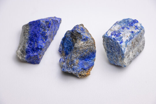 Lapiz lazuli, natural blue stones with iron pyrite inclusions and calcite veining