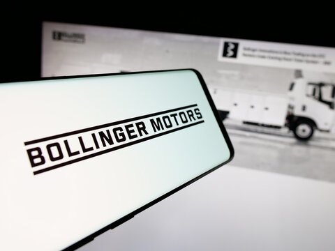 Stuttgart, Germany - 01-22-2026: Smartphone with logo of US electric vehicle company Bollinger Motors on screen in front of website. Focus on center-right of phone display.