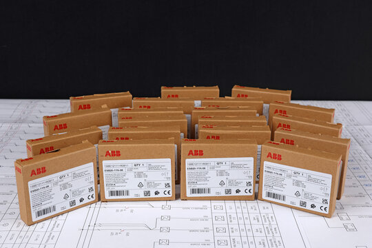 Electrical modules in carton packaging on an electronic digram during the assembly of an electrical panel. 
