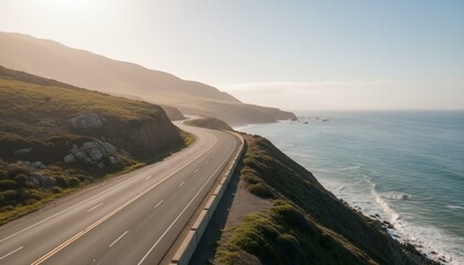 Scenic coastal highway curves along a cliffside; ocean meets the road under a golden sky