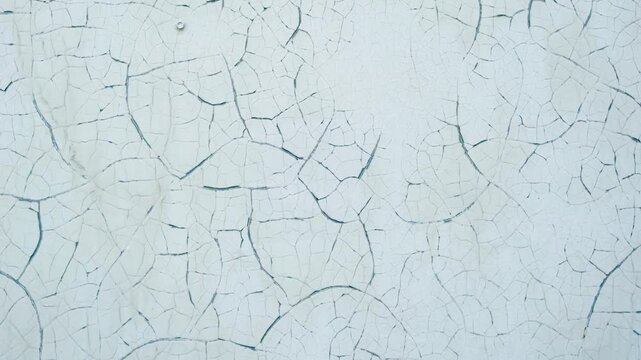 Abstract detailed close up of cracked ice surface texture revealing intricate natural winter patterns