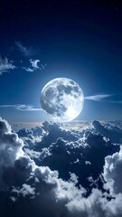 Obraz premium Full moon over clouds at night