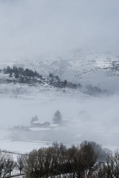 Snow-covered mountains and cloudy sky in the Pyrenees