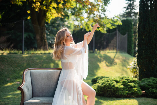 Woman in White Robe Outdoors
