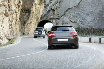 Obraz premium Car driving stunning mountain road background.