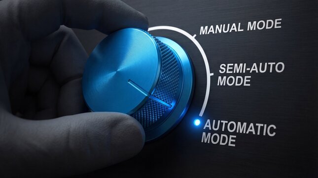 Close-up of a metallic blue dial being turned to select automatic operational mode settings