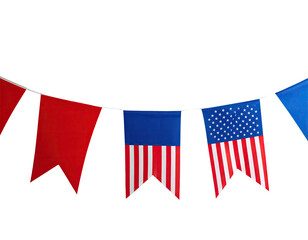 Close-up of patriotic pennant flags in red, white, and blue against a black backdrop