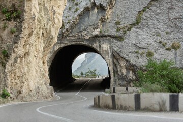 Obraz premium Car driving stunning mountain road background.