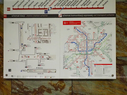 Detailed Warsaw metro and rail transport system map on a station wall