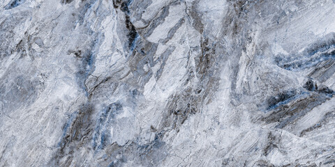 Cyan-blue colored marble texture background. A close-up image shows the intricate natural patterns...
