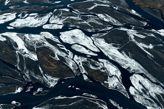 Braided glacial river landscape forming abstract patterns in iceland