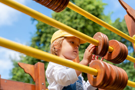 A little boy at a playground. Happy childhood.
