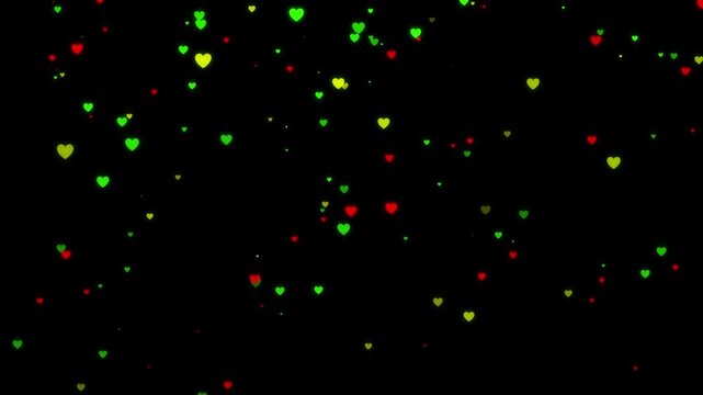 Colorful hearts floating on black background for Valentine's Day or love themed projects with red green and yellow hearts