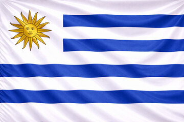 Fototapeta premium High Quality Waving Flag of Uruguay with Sun of May – Horizontal Fabric Background