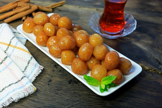Lokma Tatlısı Traditional Turkish dessert Lokma on rustic wood	