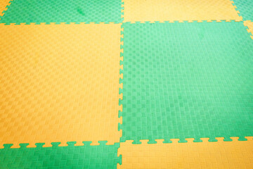 Fototapeta premium Interlocking EVA Foam Mats Form Modular Flooring Pattern