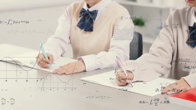 教室で勉強する女子学生と科学技術のコンセプト