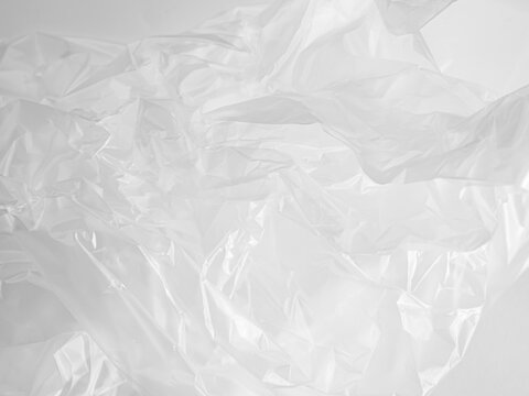 Abstract background plastic bag wihte vacuum cling foil wrinkle texture wall crumpled film foil overlay seal wrap polyethyene packaging frame material industry wrinkle template ecosystem environment