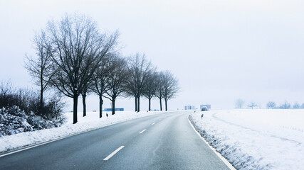 Trees have fallen in the forest due to snow, trees are lying on the roads, roads are closed, snow chaos in Germany, shoveling snow, snow in the forest, snow on the cars, snow in the village