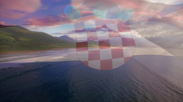 Composite video of waving croatia flag against aerial view of beach and sea waves